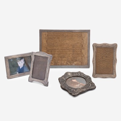 Lot 133 - A selection of five silver-mounted photograph frames.