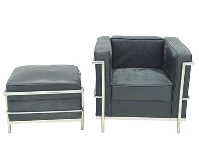 Lot 594 - After Le Corbusier - a 'LC2' style chair and footstool.