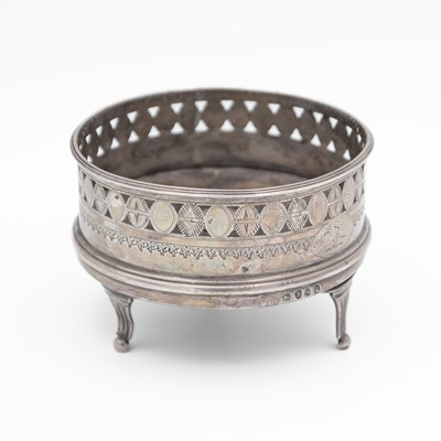 Lot 135 - A George III silver small bottle or wine coaster by Robert Hennell.