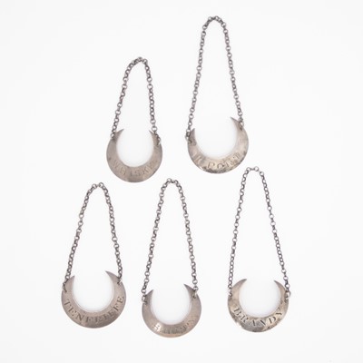 Lot 137 - Five similar George III crescent-shaped wine labels by the Bateman family.