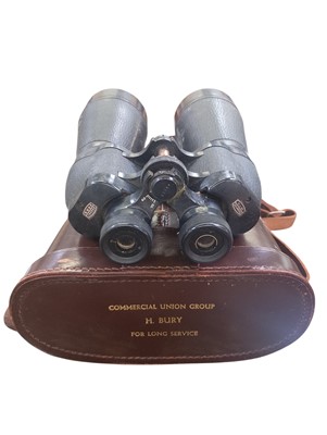 Lot 68 - A collection of eleven cased binoculars, including some military.