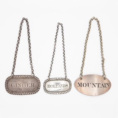 Lot 142 - A selection of three George III Scottish silver wine labels.