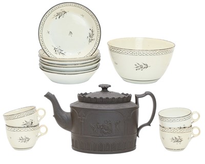 Lot 341 - A black basalt oval teapot and cover.