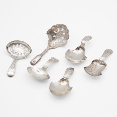 Lot 146 - A collection of six various George III silver caddy spoons, five by Joseph Taylor.