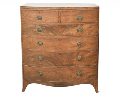 Lot 847 - A late George III mahogany bow front chest.