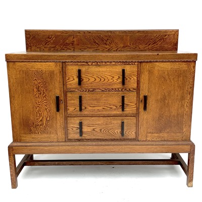 Lot 1802 - An Arts and crafts oak sideboard,with three...