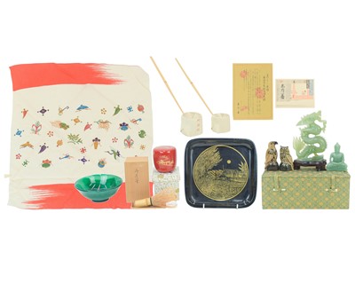 Lot 425 - A Chinese carved jade type hardstone figure of a dragon.