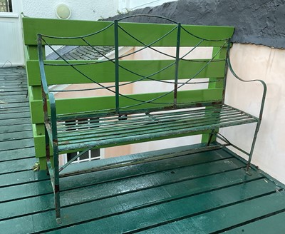 Lot 328 - a Regency style wrought iron garden bench