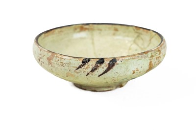 Lot 644 - A Persian Kashan pottery small bowl.