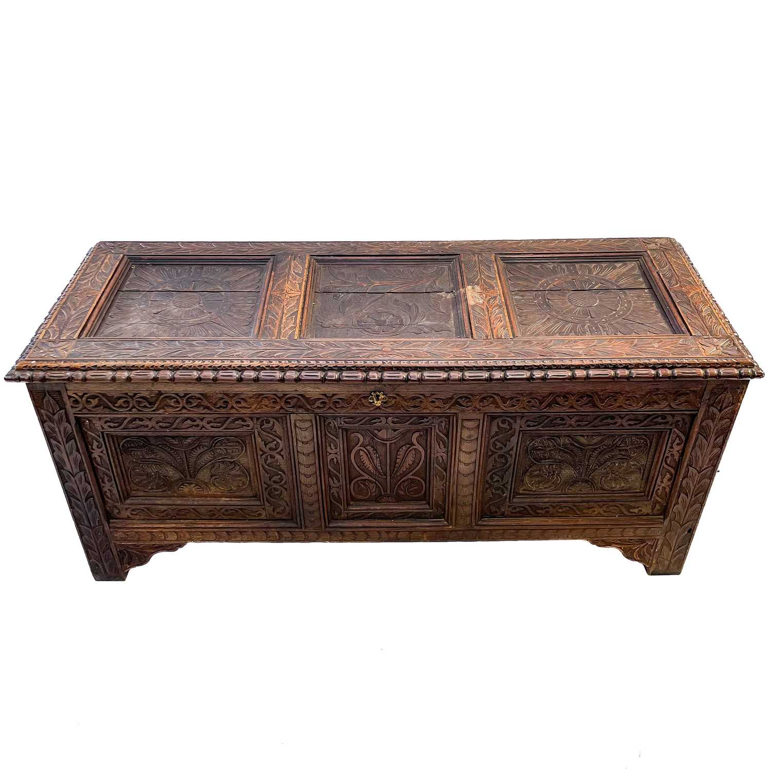 Lot 92 - A carved oak joined chest, substantially 17th century.