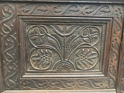 Lot 92 - A carved oak joined chest, substantially 17th century.