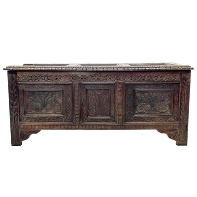 Lot 92 - A carved oak joined chest, substantially 17th century.