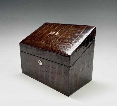 Lot 412 - An Asprey crocodile hide covered stationery box with green silk fitted interior