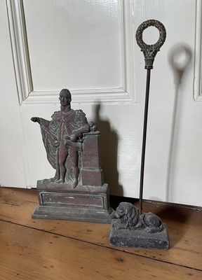 Lot 24 - King William IV cast brass doorstop