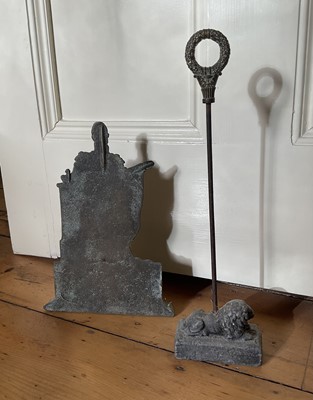Lot 24 - King William IV cast brass doorstop