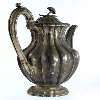 Lot 281 - A George IV silver pear shape teapot with flower finial by Richard Pearce & George Burrows