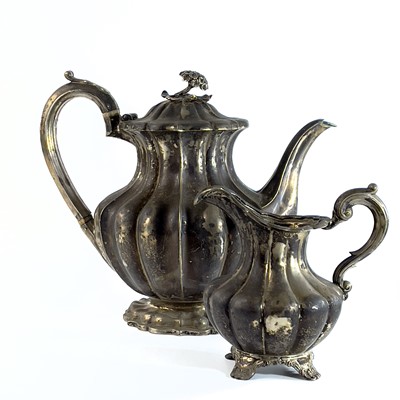 Lot 281 - A George IV silver pear shape teapot with flower finial by Richard Pearce & George Burrows