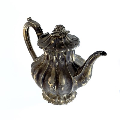 Lot 281 - A George IV silver pear shape teapot with flower finial by Richard Pearce & George Burrows
