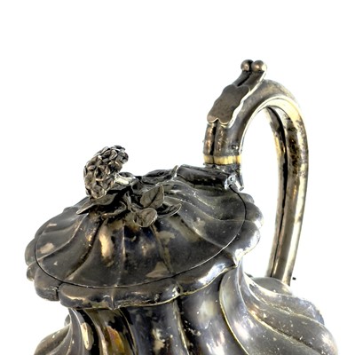 Lot 281 - A George IV silver pear shape teapot with flower finial by Richard Pearce & George Burrows
