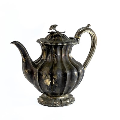 Lot 281 - A George IV silver pear shape teapot with flower finial by Richard Pearce & George Burrows