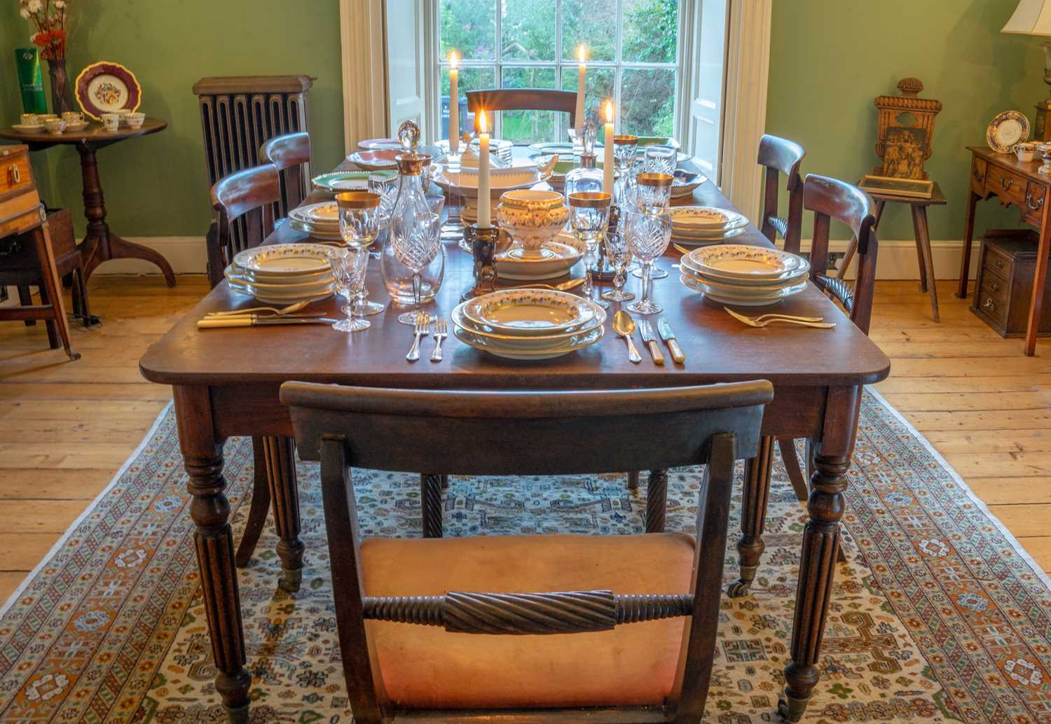Lot 90 - A Regency-style dining table
