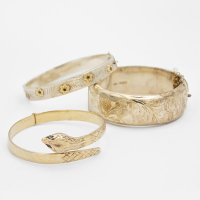 Lot 104 - Three silver hallmarked hinged bangles.