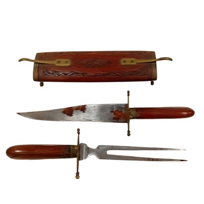 Lot 44 - A Vintage carving set in a wood and brass case...