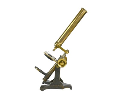 Lot 135 - A brass microscope.