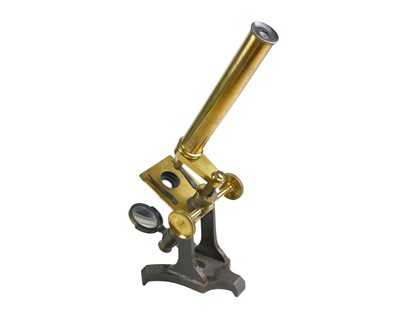 Lot 135 - A brass microscope.