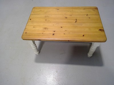 Lot 27 - A Pine Coffee Table. The Table is 47cm tall,...