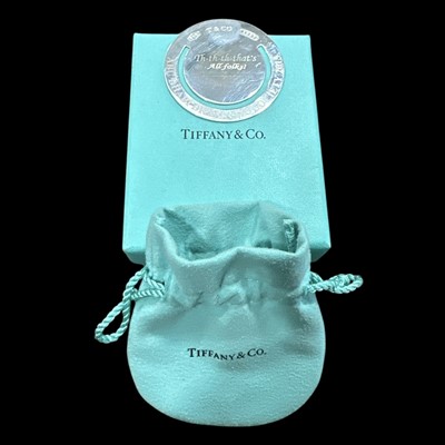 Lot 16 - A Tiffany & Co. silver bookmark presented by...