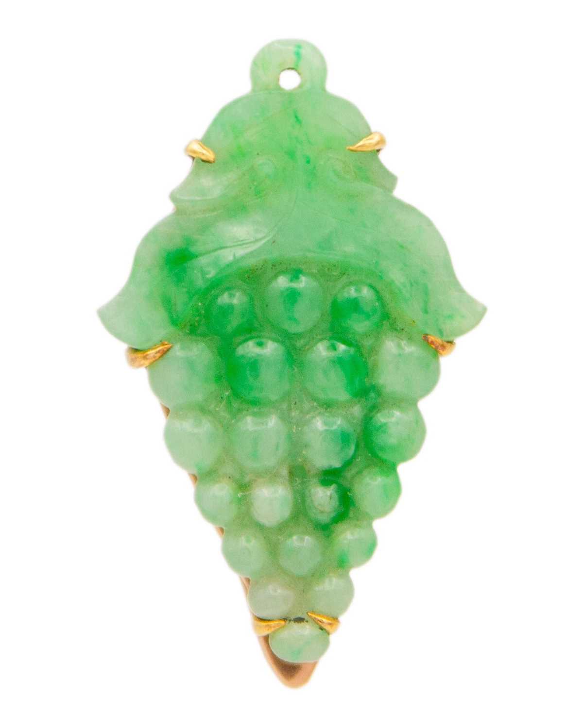 Lot 3 - An Art Deco rose gold green jadeite set dress clip.