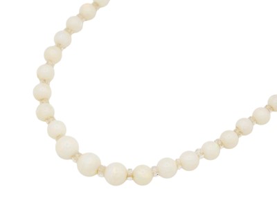 Lot 7 - A white opal and cut crystal graduated bead necklace with 9k white gold clasp.