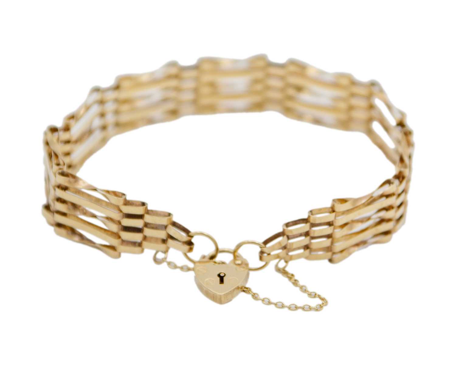 Lot 14 - A 9k hallmarked gold five-bar gate-link bracelet with padlock clasp.