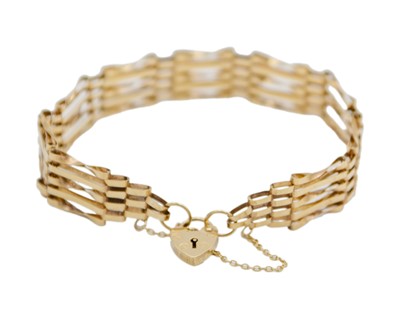 Lot 14 - A 9k hallmarked gold five-bar gate-link bracelet with padlock clasp.