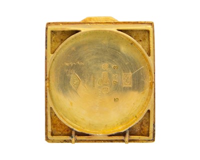 Lot 31 - An 18k hallmarked gold wristwatch case back.