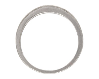 Lot 60 - A platinum diamond set band ring.