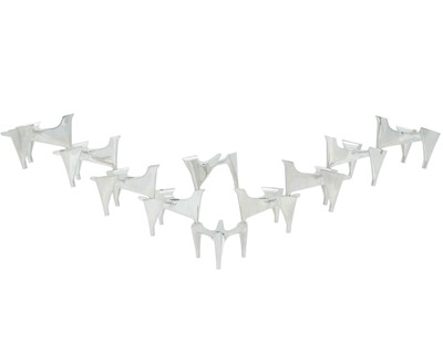 Lot 693 - A set of Hammonia Motard modernist candle holders.