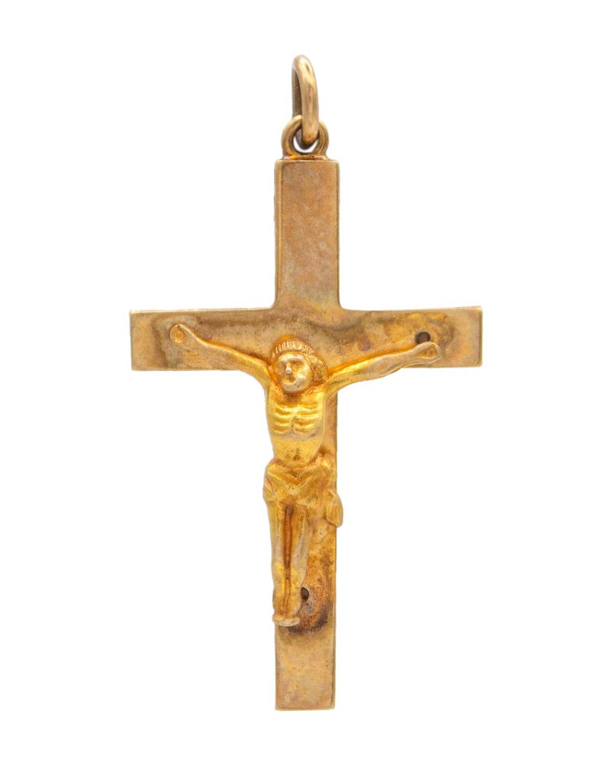 Lot 58 - A 9k hallmarked gold crucifix pendant.