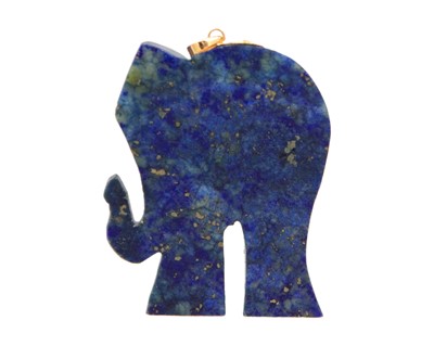 Lot 56 - A gold-mounted lapis lazuli elephant pendant.