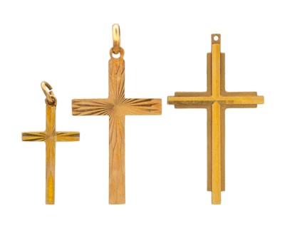 Lot 55 - A selection of three 9k hallmarked gold cross pendants.