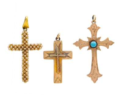 Lot 37 - Two Victorian gold cross pendants and a woven sea pearl cross pendant with gold bale.