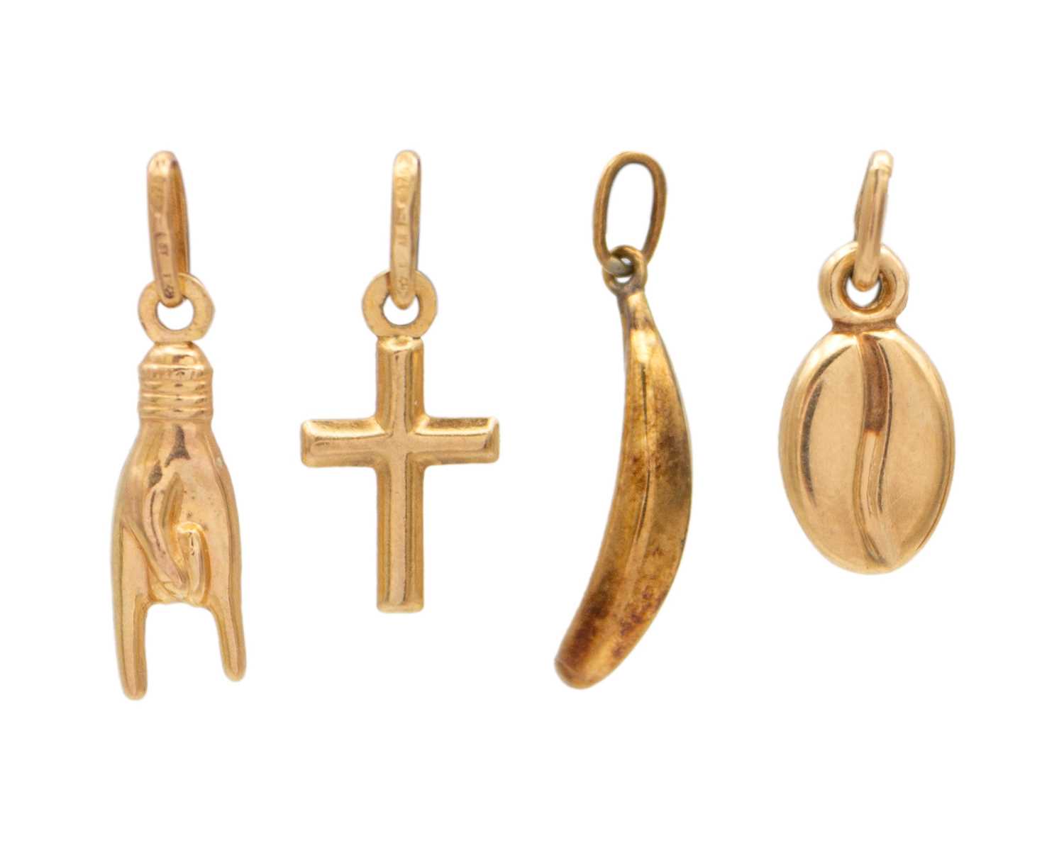 Lot 53 - A selection of four 9k charms.