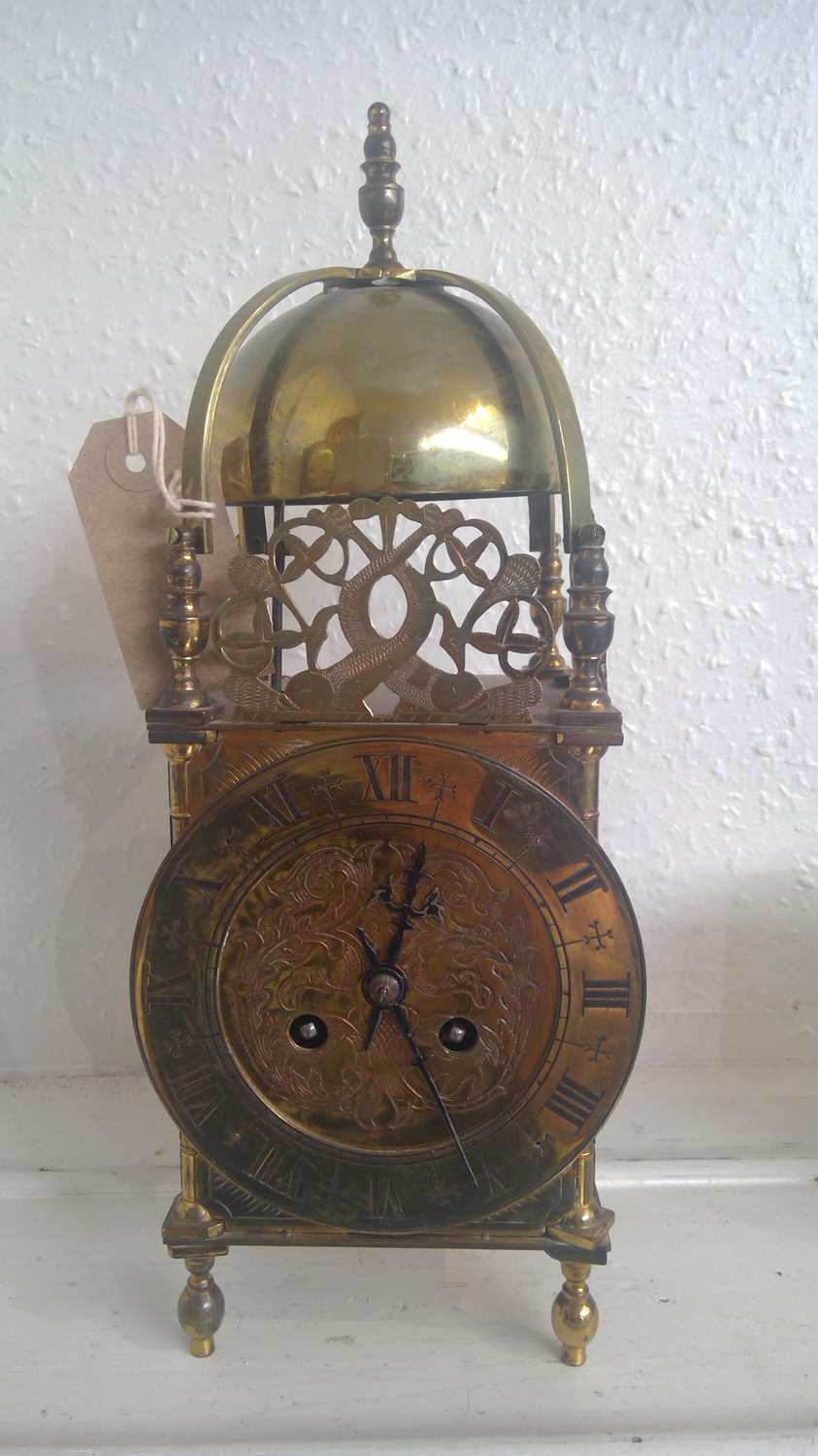 Lot 2903 - A reproduction brass lantern clock, fitted...