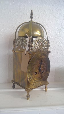 Lot 2903 - A reproduction brass lantern clock, fitted...