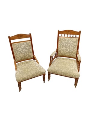 Lot 91 - Two Edwardian oak upholstered armchairs on...