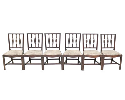 Lot 882 - A set of six late George III mahogany dining chairs.