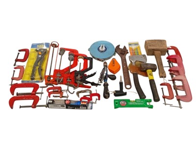 Lot 102 - A selection of hand tools, including clamps,...