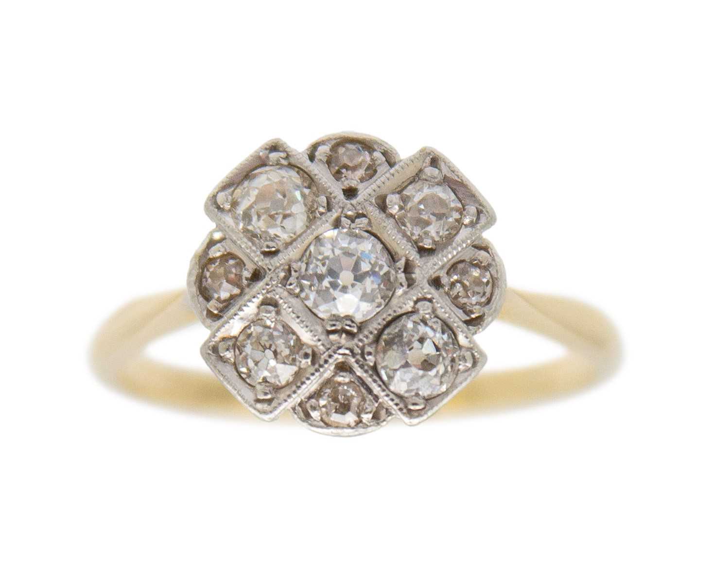 Lot 21 - An attractive Art Deco 18k and platinum diamond set ring.