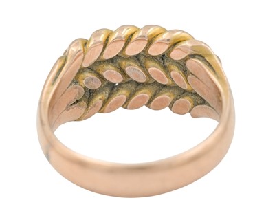 Lot 70 - An Edwardian 9k keeper ring.